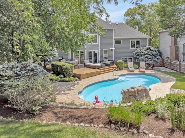 5024 Switch Grass Ln, Naperville, IL 60564 - outdoor pool with a wooden deck and an outdoor living space