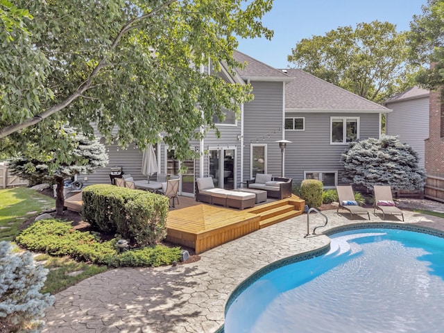 5024 Switch Grass Ln, Naperville, IL 60564 - swimming pool with a wooden deck, outdoor lounge area, and a patio