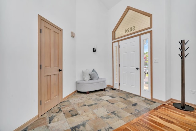 5024 Switch Grass Ln, Naperville, IL 60564 - foyer with a towering ceiling and light stone finish floors