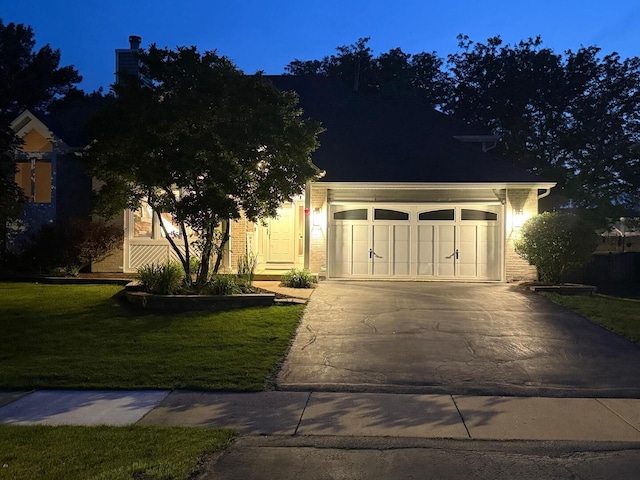 5024 Switch Grass Ln, Naperville, IL 60564 - view of front of house with concrete driveway, a yard, and a garage