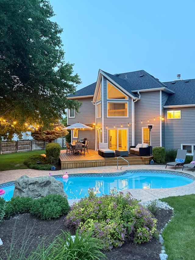 5024 Switch Grass Ln, Naperville, IL 60564 - rear view of property with a deck, outdoor lounge area, an outdoor pool, and a shingled roof