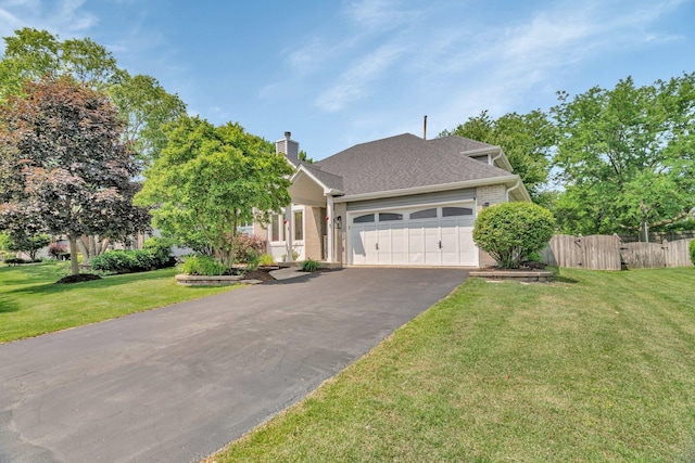 5024 Switch Grass Ln, Naperville, IL 60564 - view of front of property with asphalt driveway, a garage, brick siding, a chimney, and roof with shingles