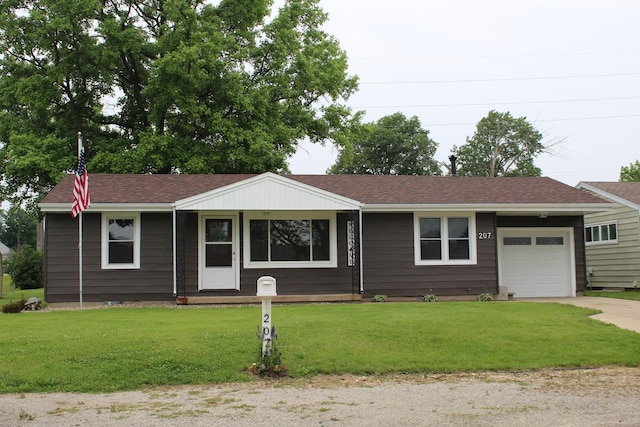 207 Cedar Dr, Clinton, IL 61727 - ranch-style house with concrete driveway, an attached garage, a front lawn, and roof with shingles