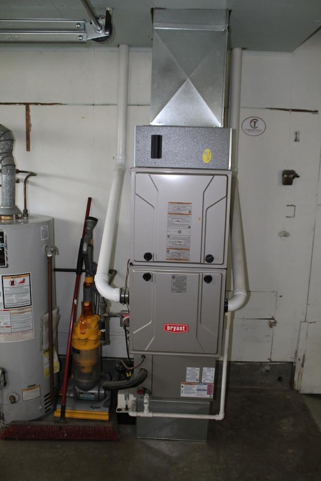 207 Cedar Dr, Clinton, IL 61727 - utility room with water heater