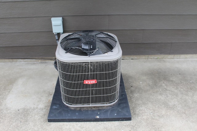 207 Cedar Dr, Clinton, IL 61727 - exterior view of a central air condition unit