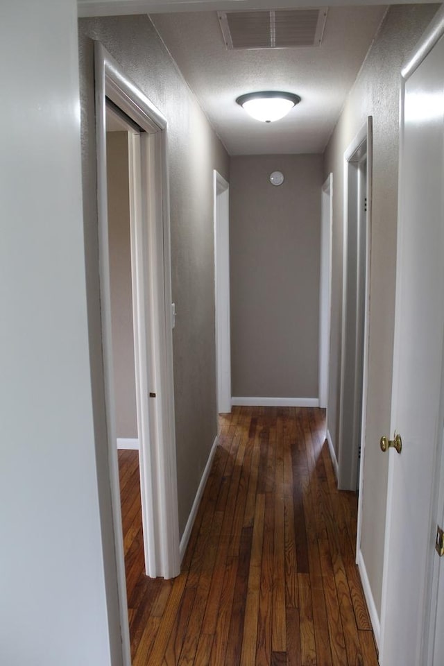 207 Cedar Dr, Clinton, IL 61727 - corridor with hardwood / wood-style flooring and baseboards