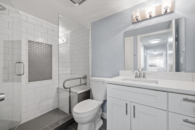 5540 Walnut Ave Unit 9A, Downers Grove, IL 60515 - bathroom with a shower stall, vanity, and tile patterned flooring