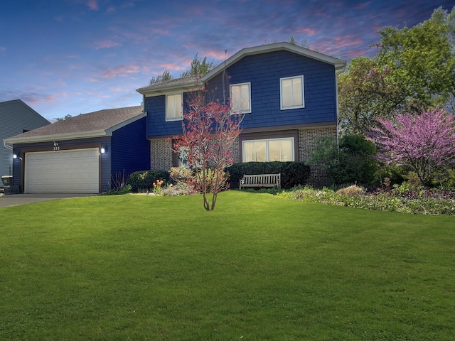 323 W Golf Rd, Libertyville, IL 60048 - traditional-style house featuring a front lawn, brick siding, and a garage