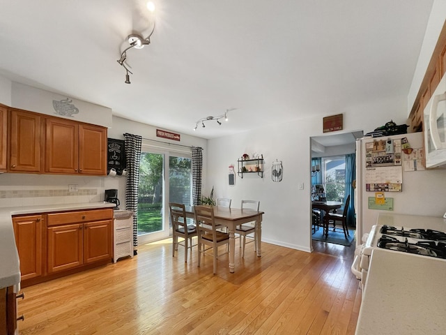 323 W Golf Rd, Libertyville, IL 60048 - dining room with plenty of natural light, light wood-type flooring, and track lighting