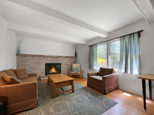 323 W Golf Rd, Libertyville, IL 60048 - living area featuring beam ceiling, wood finished floors, and a fireplace