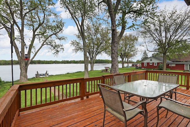 10317 195th Ave, Bristol, WI 53104 - wooden terrace with a water view, outdoor dining area, and a yard