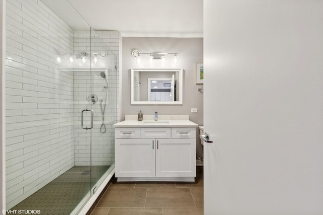 545 N Dearborn St Unit 3207, Chicago, IL 60654 - bathroom with vanity, a shower stall, and tile patterned floors