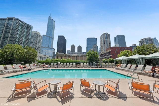 545 N Dearborn St Unit 3207, Chicago, IL 60654 - community pool featuring a skyline view and a patio