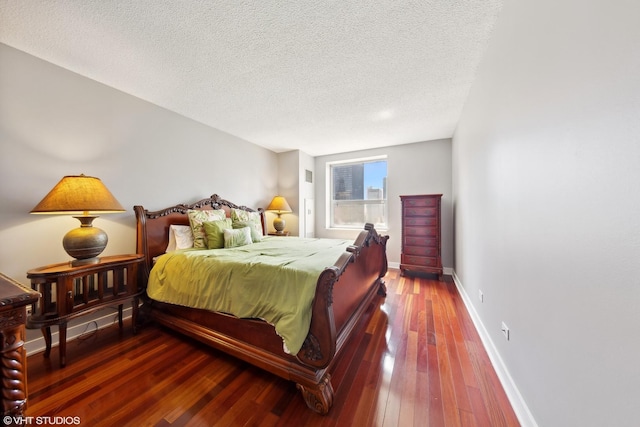 545 N Dearborn St Unit 3207, Chicago, IL 60654 - bedroom featuring a textured ceiling and hardwood / wood-style flooring