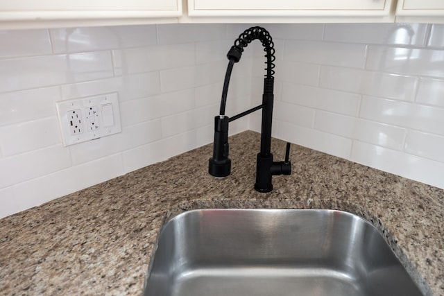 126 E Ave, La Grange, IL 60525 - kitchen view of backsplash, white cabinets, and light stone countertops