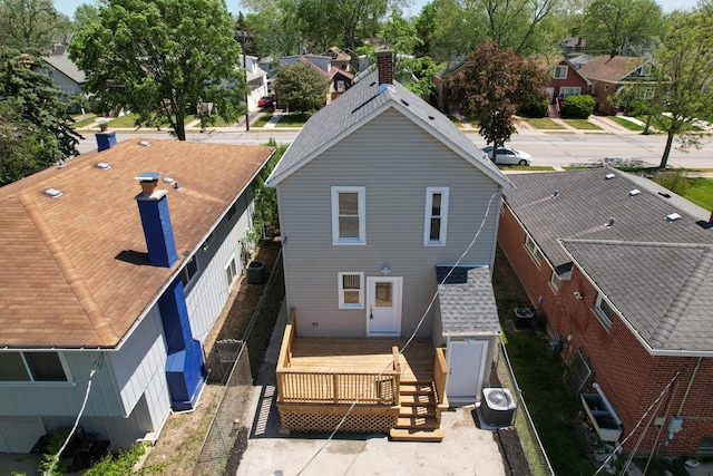 126 E Ave, La Grange, IL 60525 - back of house featuring a residential view, a deck, and roof with shingles