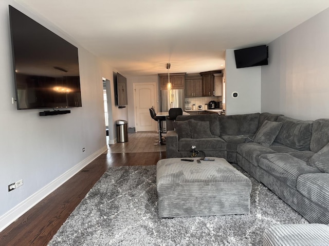 7743 Cronin Ave, Justice, IL 60458 - living area featuring dark wood-style flooring and baseboards