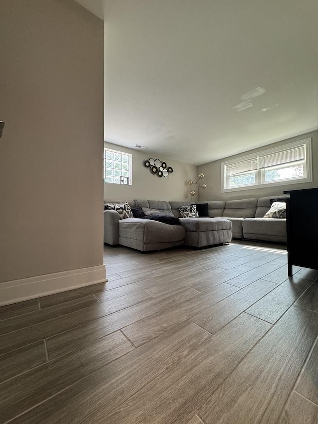 7743 Cronin Ave, Justice, IL 60458 - living area with dark wood-type flooring and baseboards