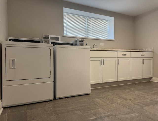 7743 Cronin Ave, Justice, IL 60458 - laundry area with washing machine and dryer, cabinet space, and plenty of natural light