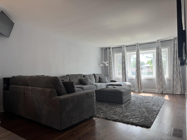 7743 Cronin Ave, Justice, IL 60458 - living room featuring dark wood-style flooring and baseboards