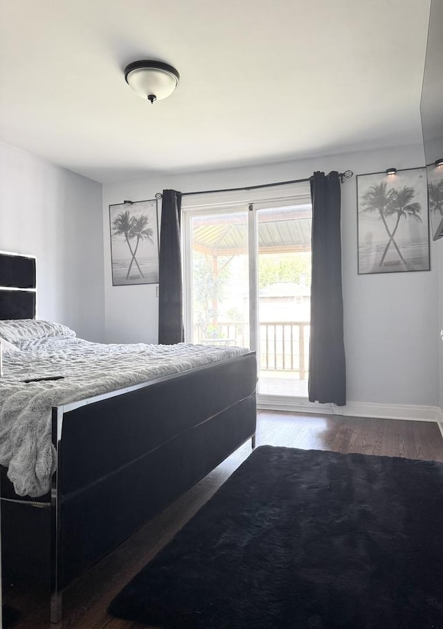 7743 Cronin Ave, Justice, IL 60458 - bedroom with wood finished floors and access to exterior