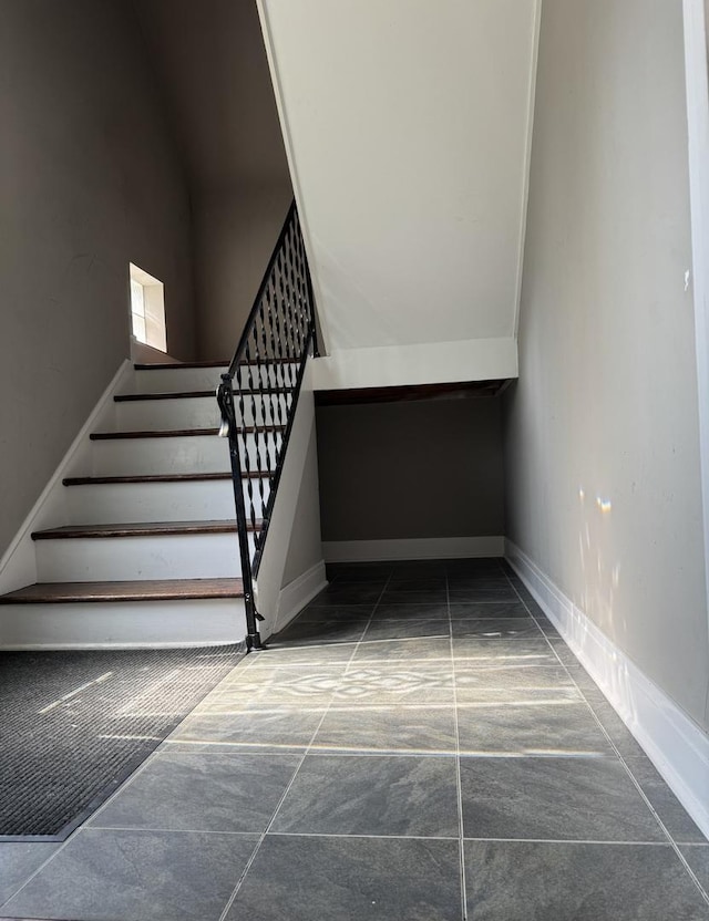 7743 Cronin Ave, Justice, IL 60458 - staircase with baseboards and concrete floors