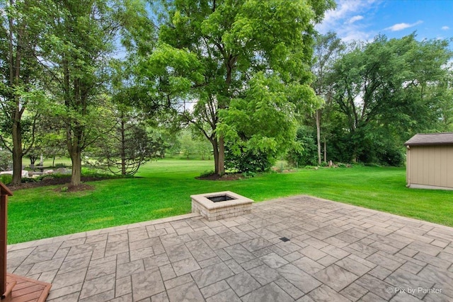 1103 Paul Ct, Fox River Grove, IL 60021 - view of patio / terrace featuring an outdoor fire pit and view of scattered trees