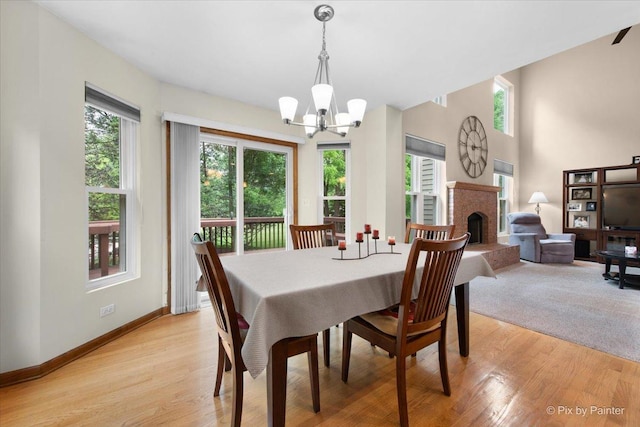 1103 Paul Ct, Fox River Grove, IL 60021 - dining area with plenty of natural light, light wood-style flooring, and a chandelier