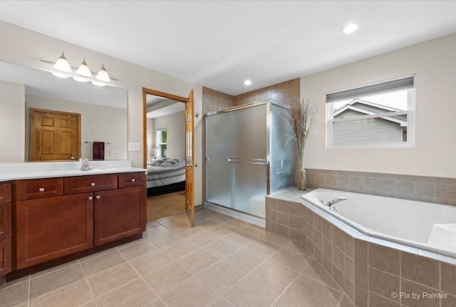 1103 Paul Ct, Fox River Grove, IL 60021 - ensuite bathroom with vanity, a garden tub, a shower stall, healthy amount of natural light, and recessed lighting
