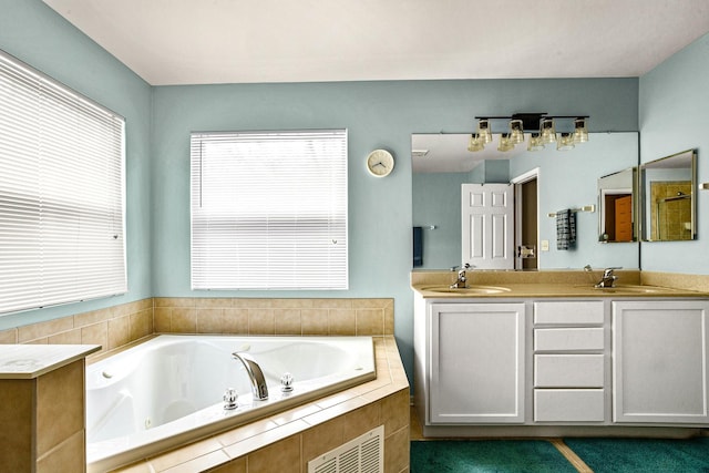 184 Primrose Ln, Bartlett, IL 60103 - bathroom with a jetted tub and double vanity