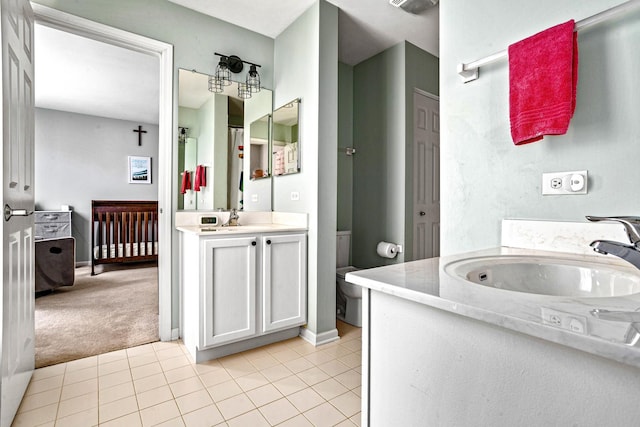 184 Primrose Ln, Bartlett, IL 60103 - bathroom with two vanities and tile patterned flooring