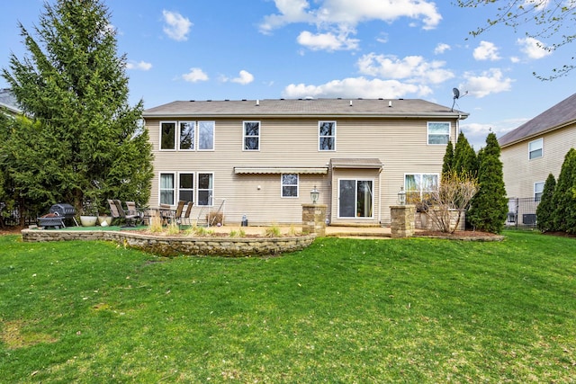 184 Primrose Ln, Bartlett, IL 60103 - rear view of property featuring a patio area and a yard