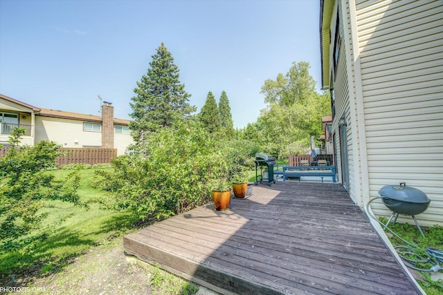 1330 S Mallard Ln, Mount Prospect, IL 60056 - wooden terrace featuring a grill and a lawn