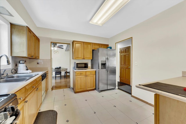 1330 S Mallard Ln, Mount Prospect, IL 60056 - kitchen featuring stainless steel appliances, light countertops, tasteful backsplash, and a ceiling fan