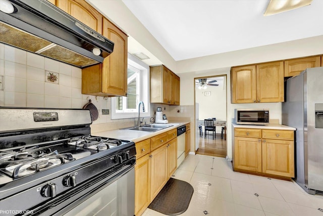 1330 S Mallard Ln, Mount Prospect, IL 60056 - kitchen featuring appliances with stainless steel finishes, exhaust hood, light countertops, decorative backsplash, and light tile patterned floors