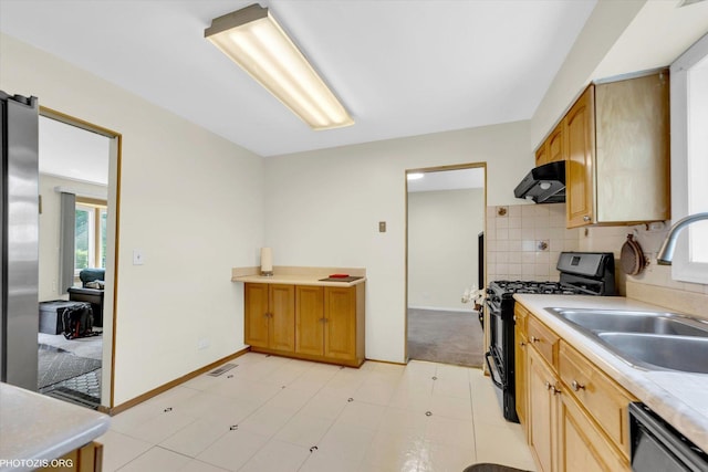 1330 S Mallard Ln, Mount Prospect, IL 60056 - kitchen with range with gas stovetop, dishwasher, plenty of natural light, and exhaust hood