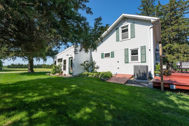 1392 Red Brick Rd, Dixon, IL 61021 - back of house featuring a deck and a lawn