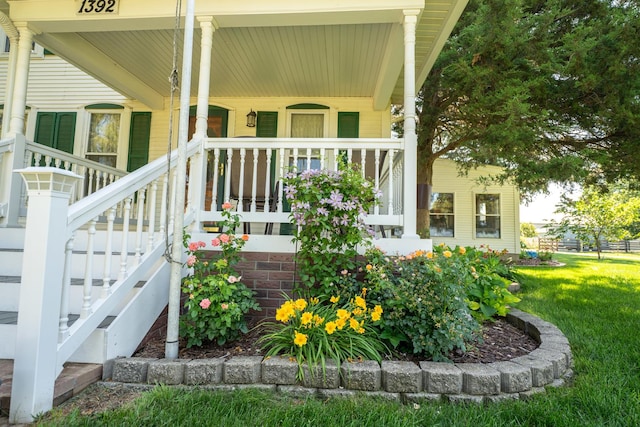 1392 Red Brick Rd, Dixon, IL 61021 - entrance to property featuring a porch and a lawn
