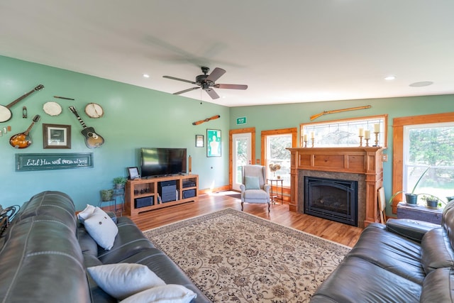 1392 Red Brick Rd, Dixon, IL 61021 - living room featuring wood finished floors, a fireplace, ceiling fan, and recessed lighting