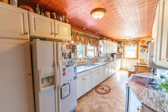 1392 Red Brick Rd, Dixon, IL 61021 - kitchen featuring white appliances, ornamental molding, light stone countertops, white cabinetry, and light tile patterned flooring