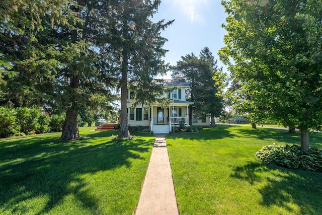 1392 Red Brick Rd, Dixon, IL 61021 - view of front facade featuring a porch and a front yard