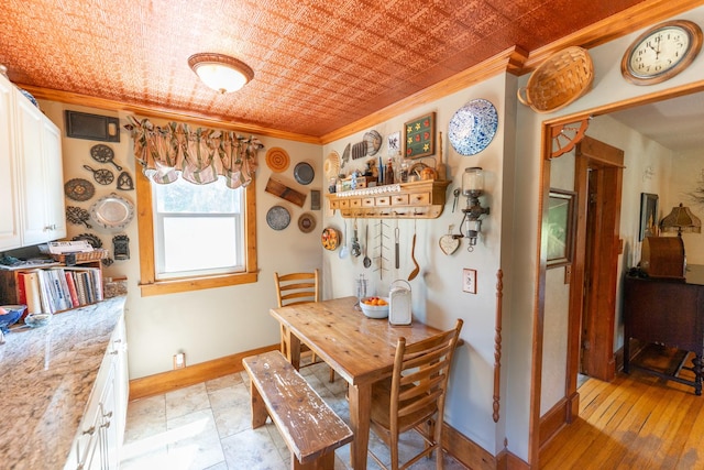 1392 Red Brick Rd, Dixon, IL 61021 - dining area featuring crown molding and baseboards