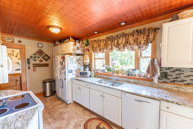 1392 Red Brick Rd, Dixon, IL 61021 - kitchen with white appliances, ornamental molding, white cabinetry, tasteful backsplash, and light stone counters