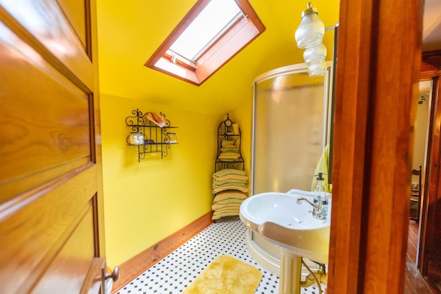 1392 Red Brick Rd, Dixon, IL 61021 - bathroom with a skylight, a stall shower, and vaulted ceiling