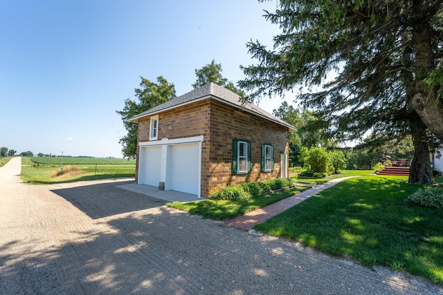 1392 Red Brick Rd, Dixon, IL 61021 - garage featuring gravel driveway