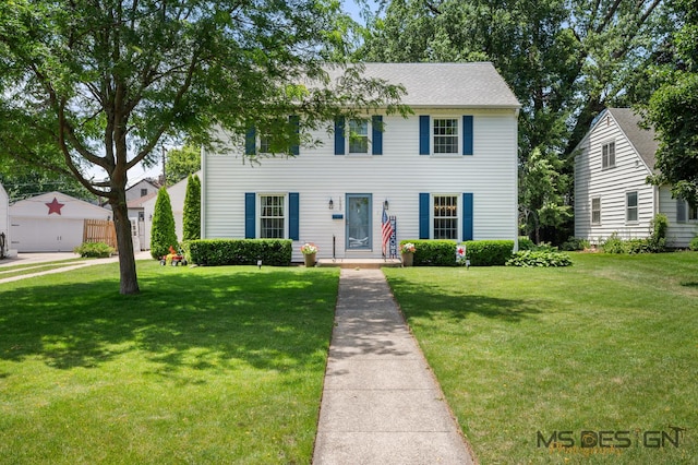 1050 N 8th St, Rochelle, IL 61068 - colonial house featuring a front lawn