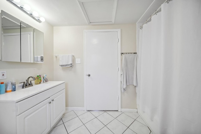 3348 N Narragansett Ave, Chicago, IL 60634 - bathroom with vanity and tile patterned floors