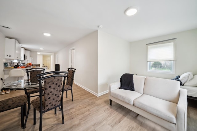 3348 N Narragansett Ave, Chicago, IL 60634 - dining space with light wood-type flooring and recessed lighting