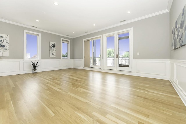 5010 W Lawrence Ave Unit 3B, Chicago, IL 60630 - unfurnished room with light wood-style flooring, recessed lighting, ornamental molding, and a wainscoted wall