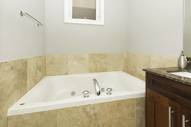 5010 W Lawrence Ave Unit 3B, Chicago, IL 60630 - full bathroom featuring a tub with jets and vanity